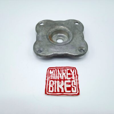 TAPA CENTRAL CAMPANA EMBRAGUE MB-D/G/R/TREX 50/90/110